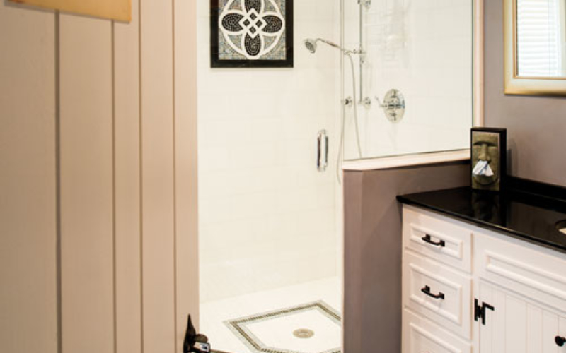 A bathroom with tile was inspired by a tumbling block pattern the owners saw at the Getty Villa near Los Angeles
