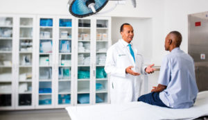 Dr. Charles Modlin with patient