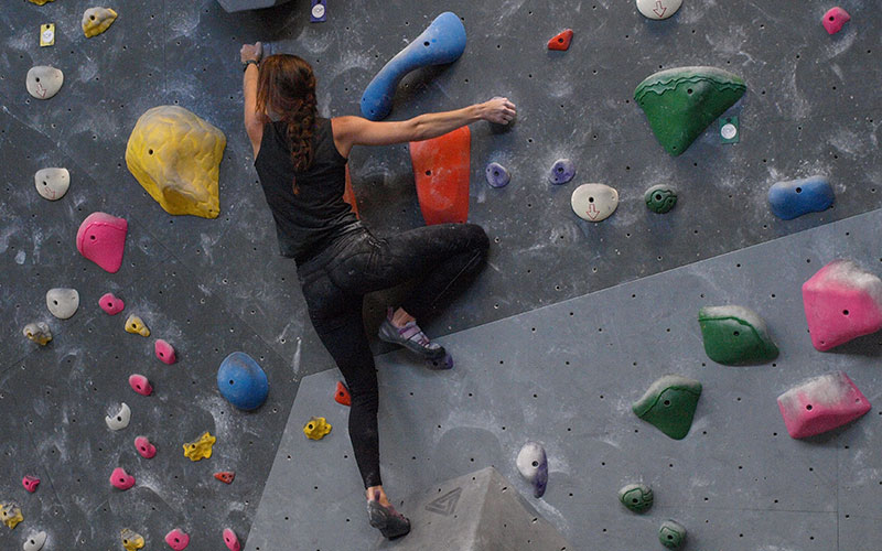 Female climber at indoor climbing gym