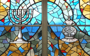 The original stained glass windows in the Shaker-Lee Synagogue