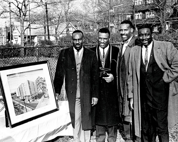 Madison (left) with his brothers Julian and Bernard, flanked by their friend Jessie Strickland, at the groundbreaking of the Mount Pleasant Medical Center.