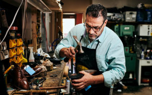 Carlos Gomez, owner of Gomez Shoe Repair