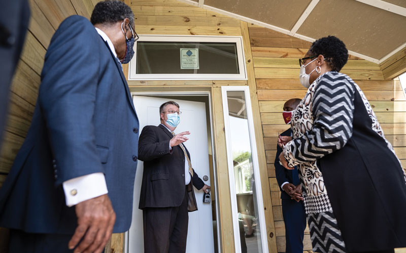 Fudge tours an affordable housing project in Kansas City, May 2021.