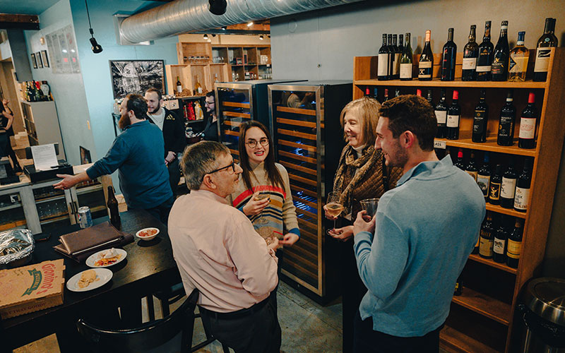 Patrons enjoying a glass of wine at Barnone