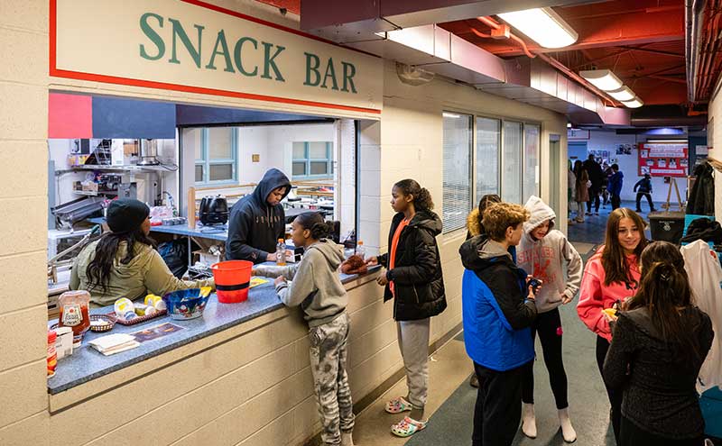Residents ordering from Susie's Q during a Friday Night skate