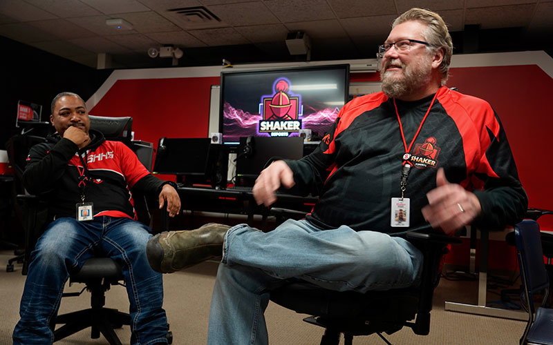 Head Coach Keith Szalay and Assistant Coach Aric Kee say running the esports team is a passion project. Szalay, a German teacher, and Kee, a paraprofessional, manage the team on top of their own full-time jobs. “They look at us as people they can relate to and rely on,” Kee says. “As a coach, you give a lot of yourself to the kids.”