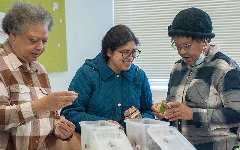 Coffee and Community attendees working on their project