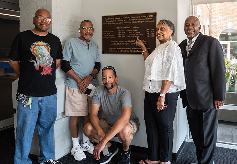 Delores Groves (second from the right) poses with her former students, including Darryl Bell (far right).