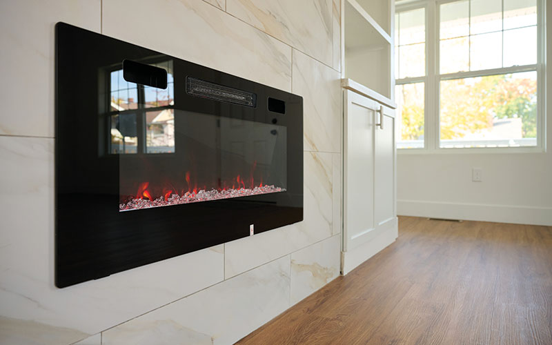 A gas fireplace in a newly completed infill home