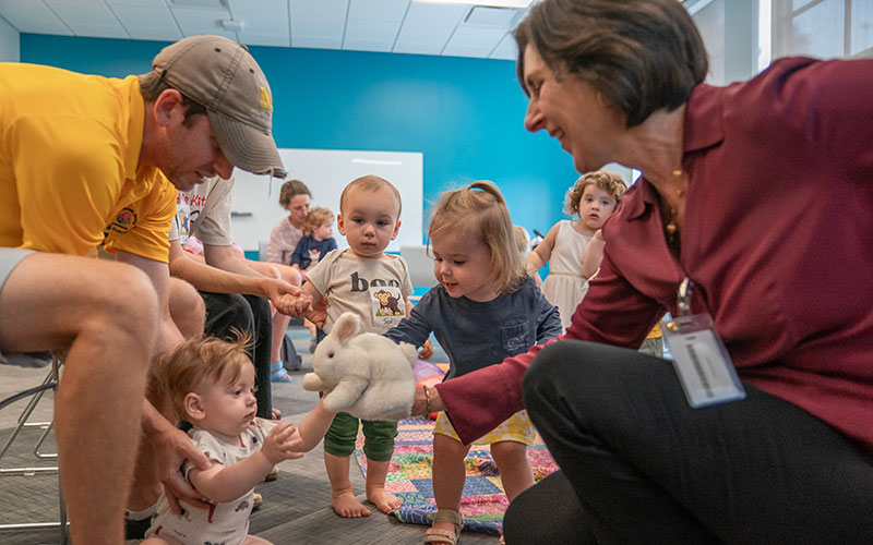 Children's librarian Nicolette Petrone interacts with children during storytime