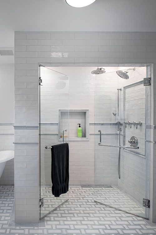 Nestled just off the primary bedroom, the new laundry space is behind doors on the second floor landing.