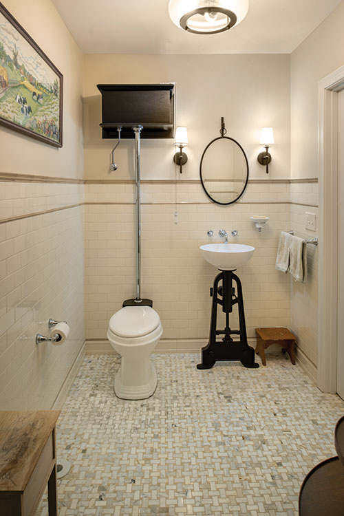 Nestled just off the primary bedroom, the new laundry space is behind doors on the second floor landing.