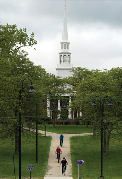 Birds eye view of bicyclists approaching a church in Shaker Heights