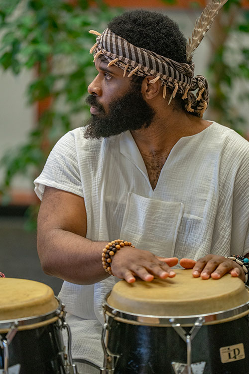 In addition to playing the drums at the Poetry Jam, Jordan R. Lee shared his poem, “I Remember.”