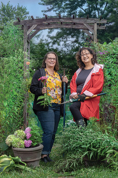 Andrea Nicola, left, and Gloria Vaquera-Little, founding board members of The Community Garden
