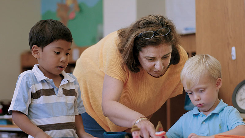 Teacher working with students at the Hanna Perkins Center