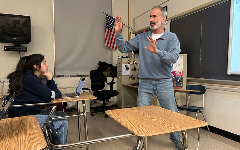 Shaker High teacher Chuck Kelly teaching students