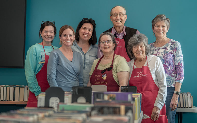 Jonas standing with other volunteers