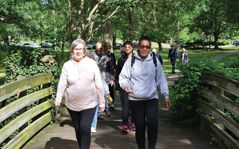 Members of the club walk at Southerly Park